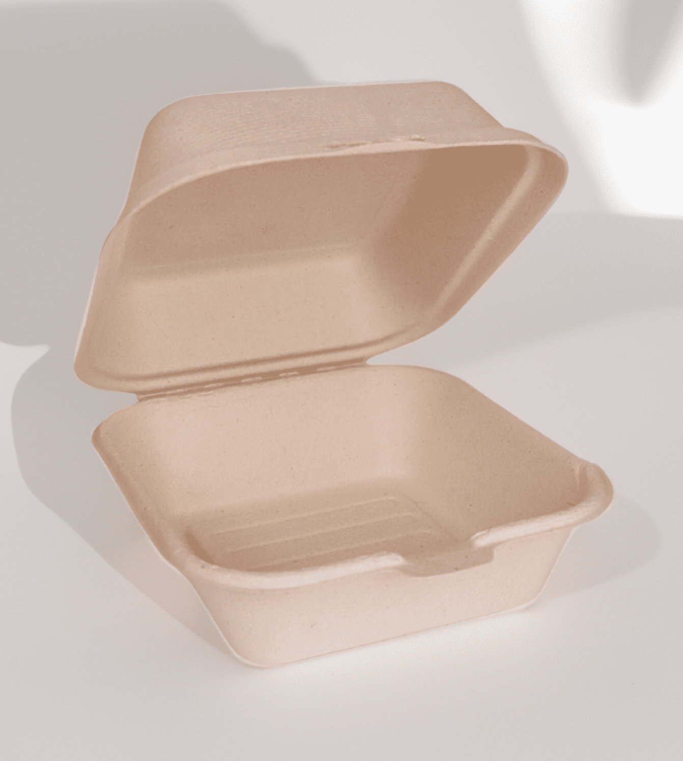 Compostable 450ml clamshell burger box made from upcycled hemp fiber for sustainable food packaging.